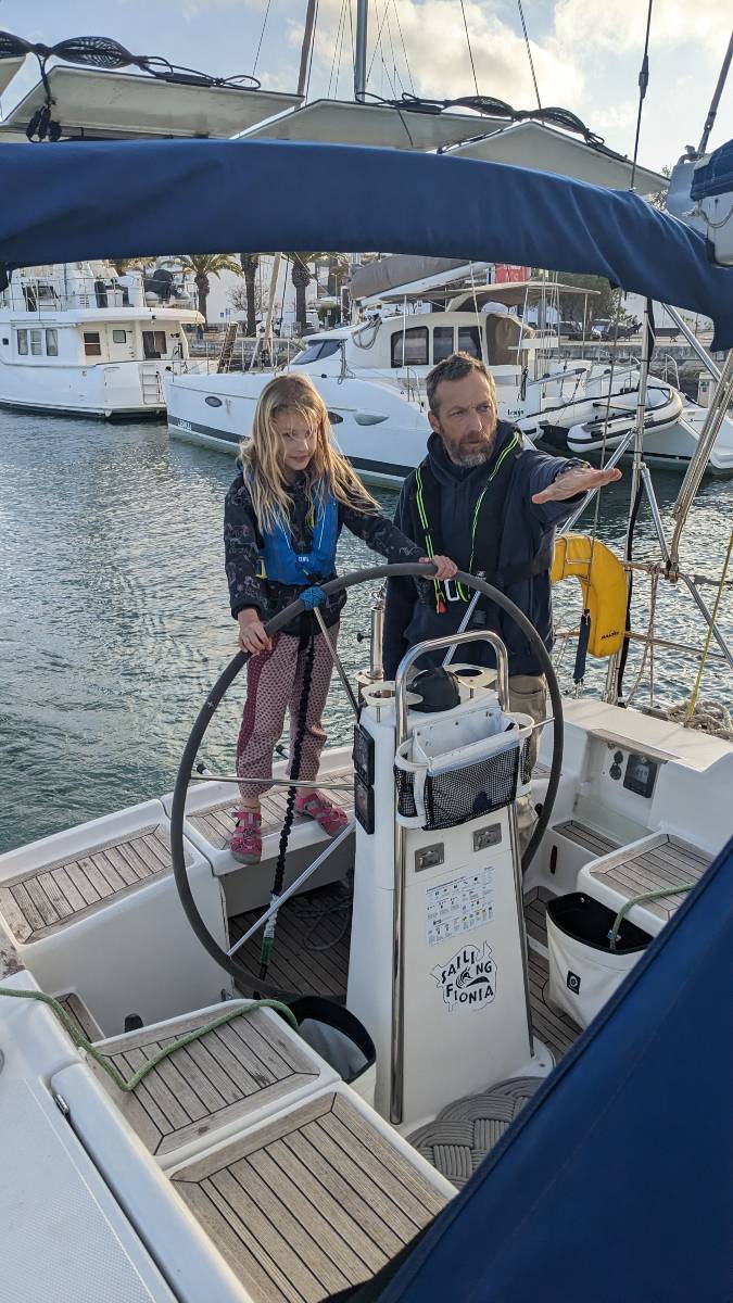 Image of a man and a girl practicing marina manoeuvres